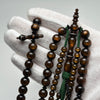 Tasbih Tijani Yusr Khor 10mm – Corail doré, ficelle verte