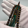 Tasbih Tijani Yusr Khor 10mm – Corail doré, ficelle verte