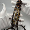 Tasbih Tijani en Yusr Khor 10mm – Corail noir reflets dorés, Ficelle jaune et noire | Kourous Artisanal