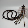 Tasbih Tijani en Yusr Khor 10mm – Corail noir reflets dorés, Ficelle jaune et noire | Kourous Artisanal