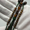 Tasbih Tijani Yusr Khor 10mm – Corail doré, ficelle verte