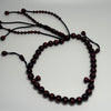Personalized coral tasbih: 33 12mm black coral beads with red highlights