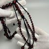 Personalized coral tasbih: 33 12mm black coral beads with red highlights