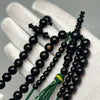 Tasbih Tijani in Yusr Khor 10 mm – Black Coral, Green String | Kourous Artisanal