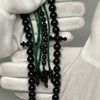 Tasbih Tijani in Yusr Khor 10 mm – Black Coral, Green String | Kourous Artisanal