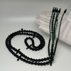 Tasbih Tijani in Yusr Khor 10 mm – Black Coral, Green String | Kourous Artisanal