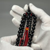 Tijani Tasbih in Yusr Khor 10 mm – Black Coral with Red String | Kourous Handmade