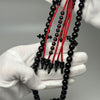 Tijani Tasbih in Yusr Khor 10 mm – Black Coral with Red String | Kourous Handmade