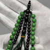 Détail des perles Marjane vert teinté avec ficelle verte, chapelet Tijani authentique