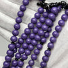 Pendentif Yusr noir et perles de corail Marjane violet, architecture Tijani