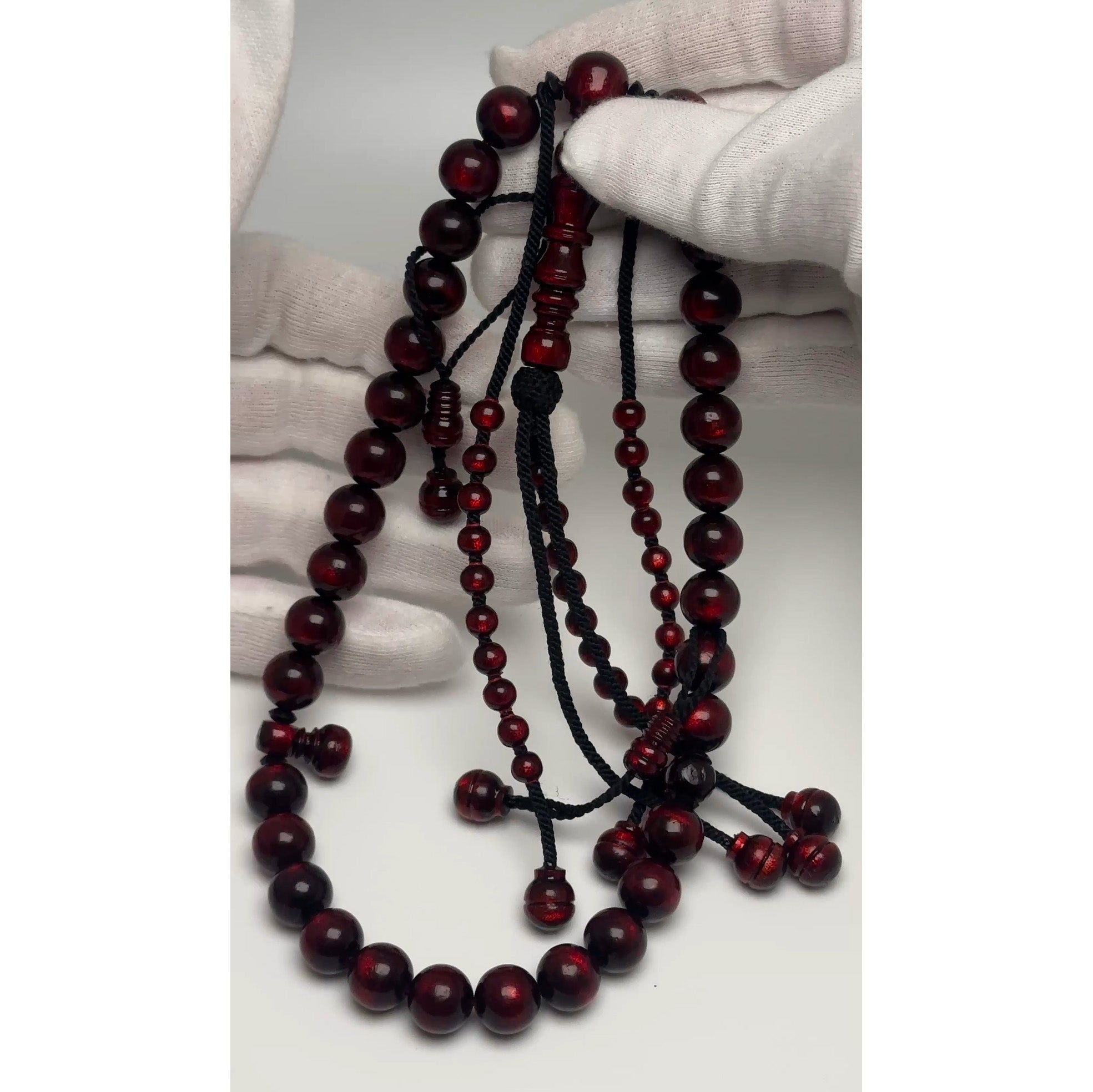 Personalized coral tasbih: 33 12mm black coral beads with red highlights