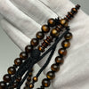 Tasbih Tijani in Yusr Khor 10 mm – Gold Coral, Black String | Kourous Artisanal 